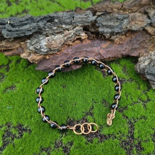 Bransoleta miedziana pleciona Onyks